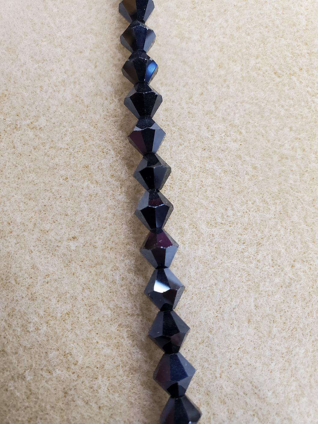 GLASS BICONE 8MM