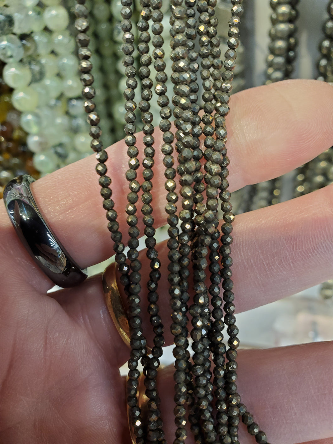 PYRITE FACETED 2MM GRADE AB
