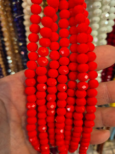GLASS FACETED 8X6MM ORANGE RED OP