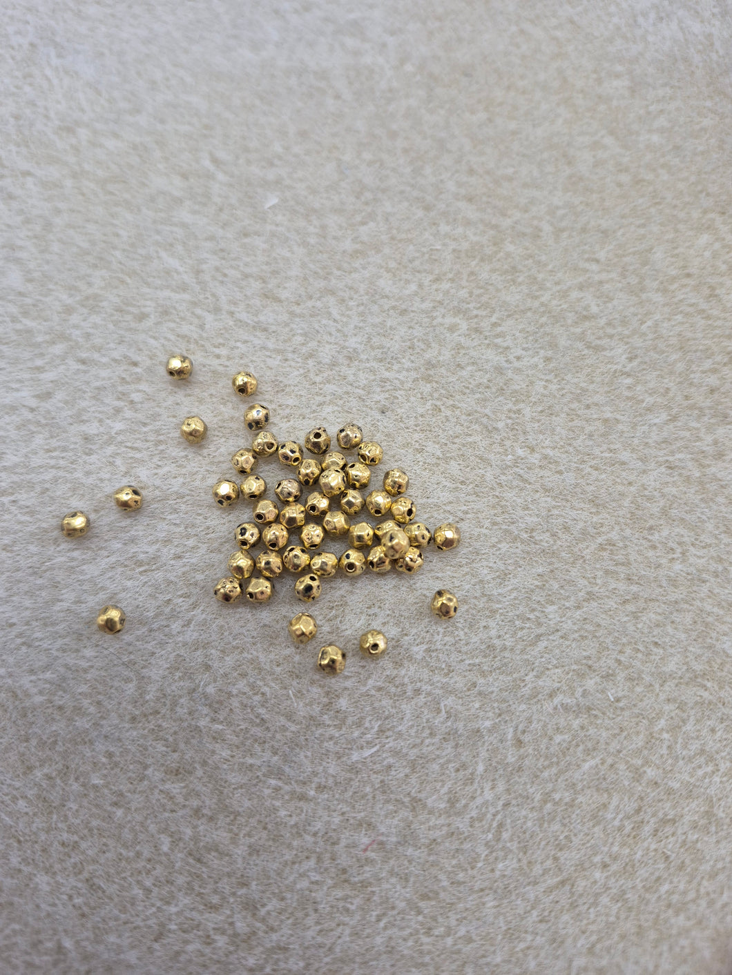 FACETED SPACER