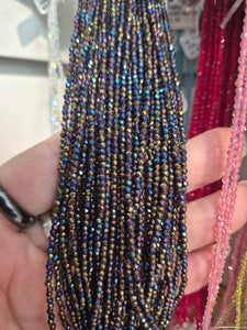 ELEC GLASS FACETED 2MM BLACK AB