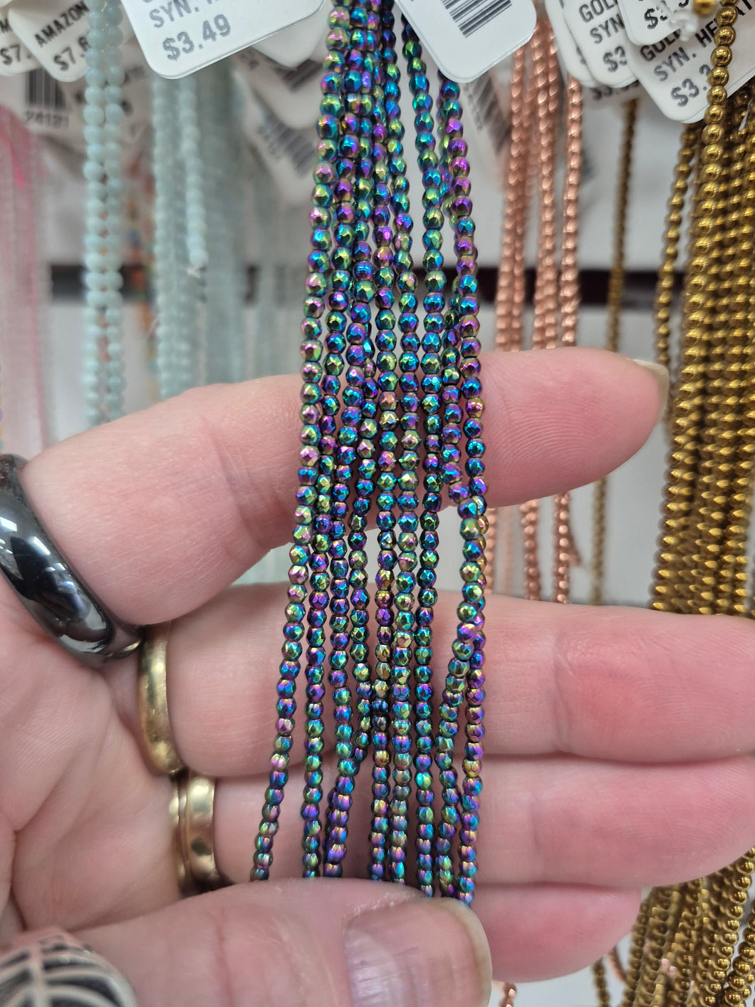 SYNTHETIC HEMATITE FACETED 2MM