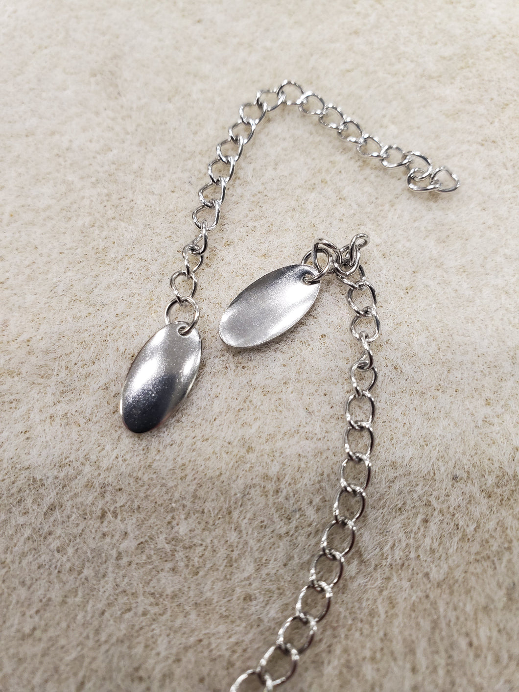 304 STAINLESS EXTENDER CHAIN /W CHARM