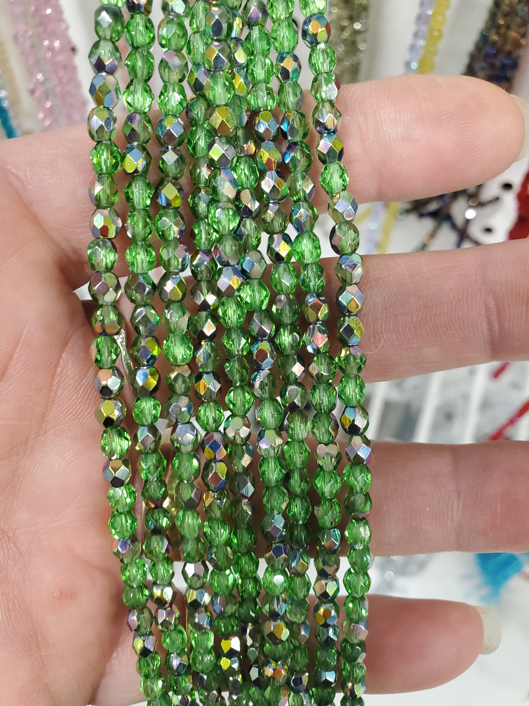 FIRE POLISHED CRYSTAL TR LT GREEN VITRAIL