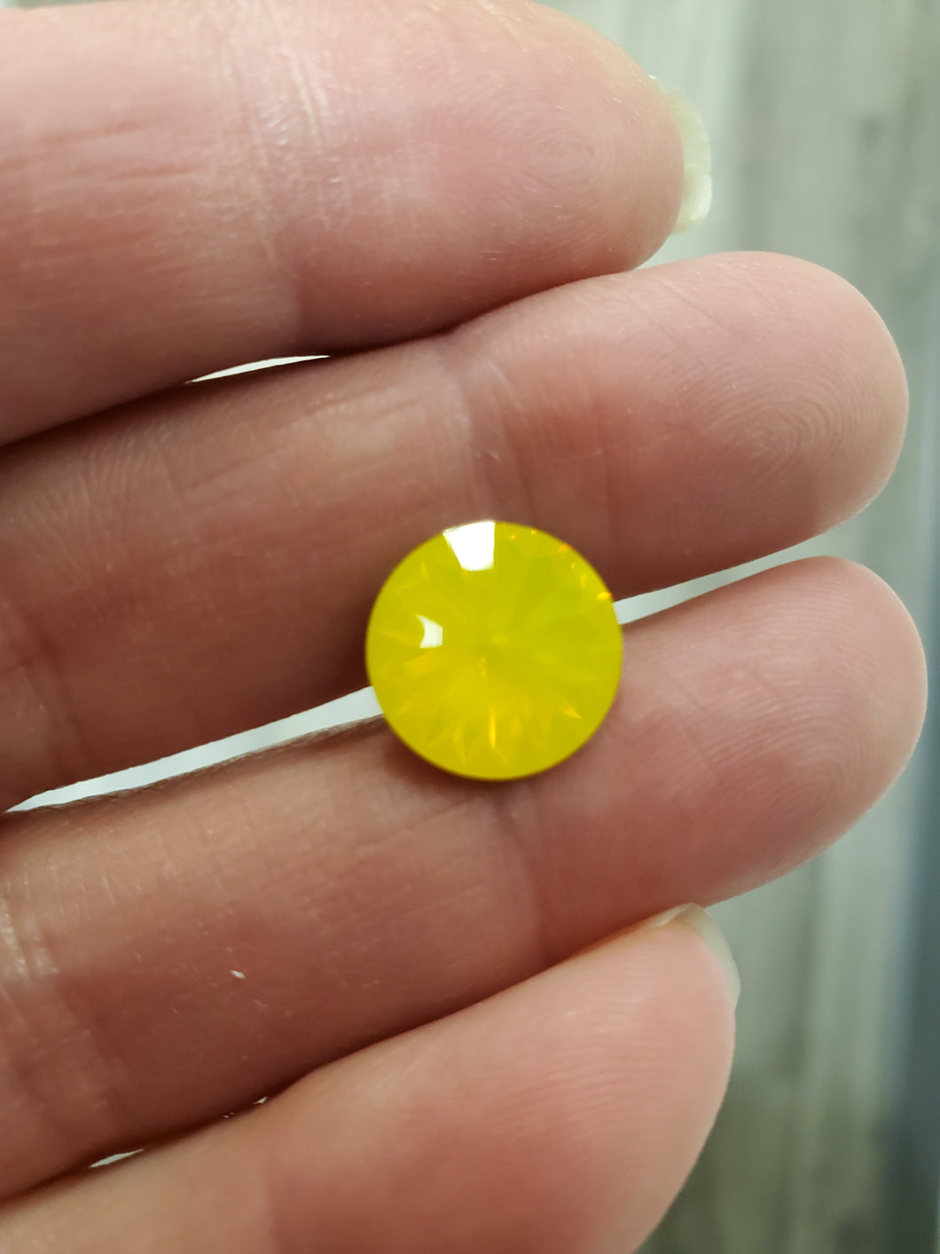 SWAR RIVOLI 1122 YELLOW OPAL 12MM