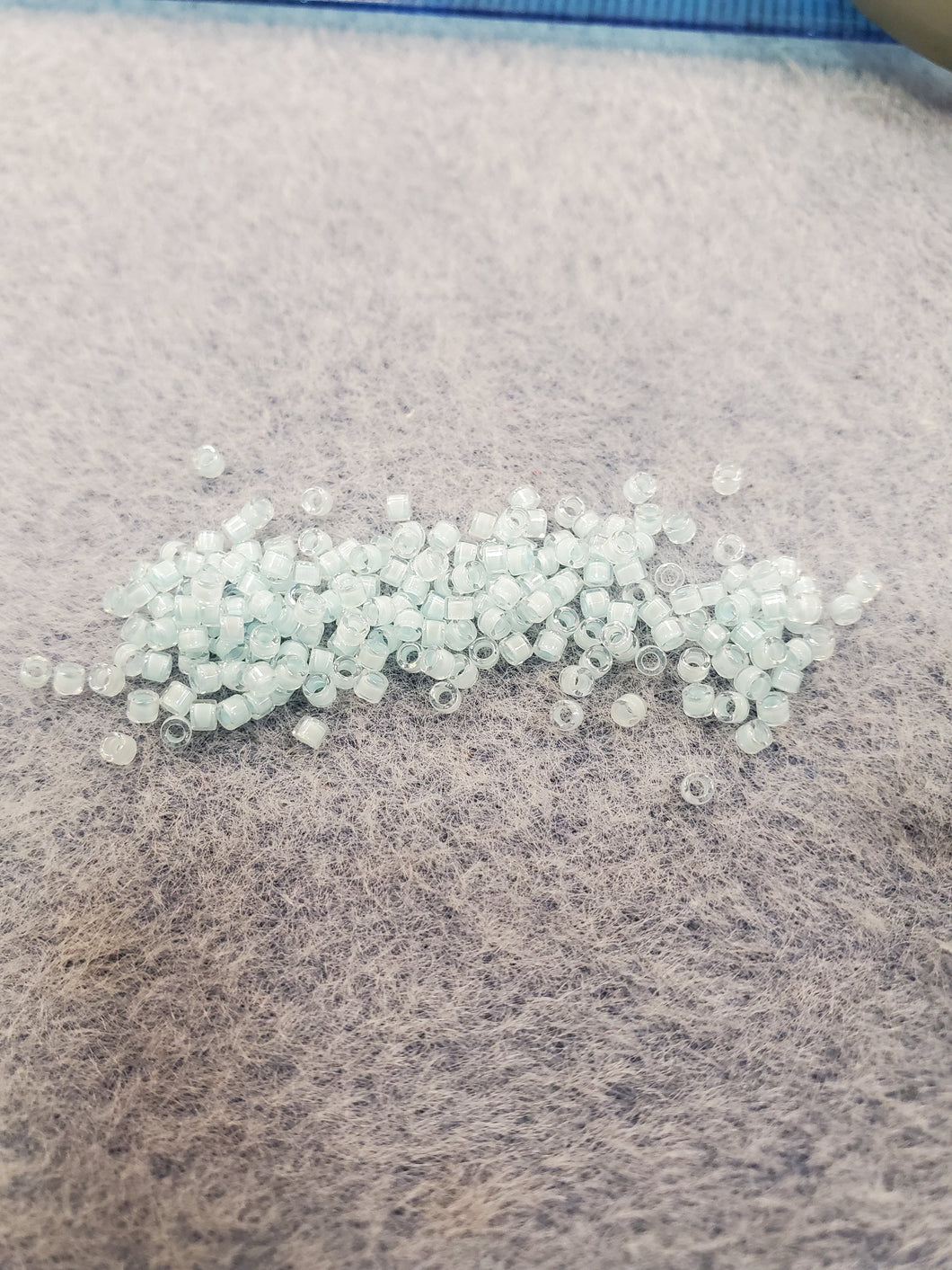 MIYUKI DELICA 11/0 AQUA AB LINED DYED 0078