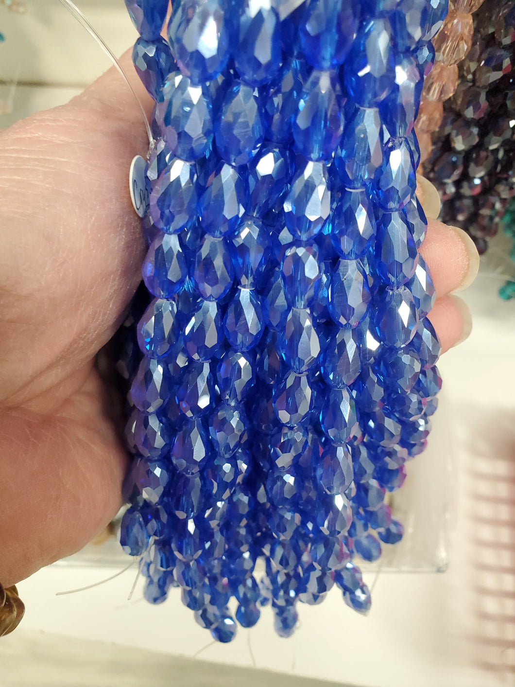 ELECTROPLATED GLASS FACETED DROP