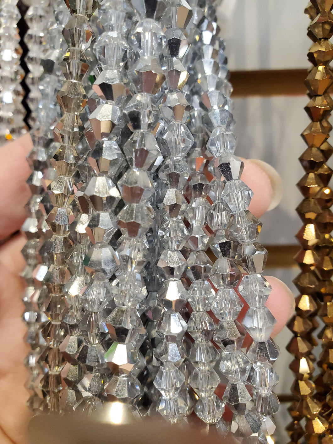 CRYSTAL FACETED BICONE 6MM