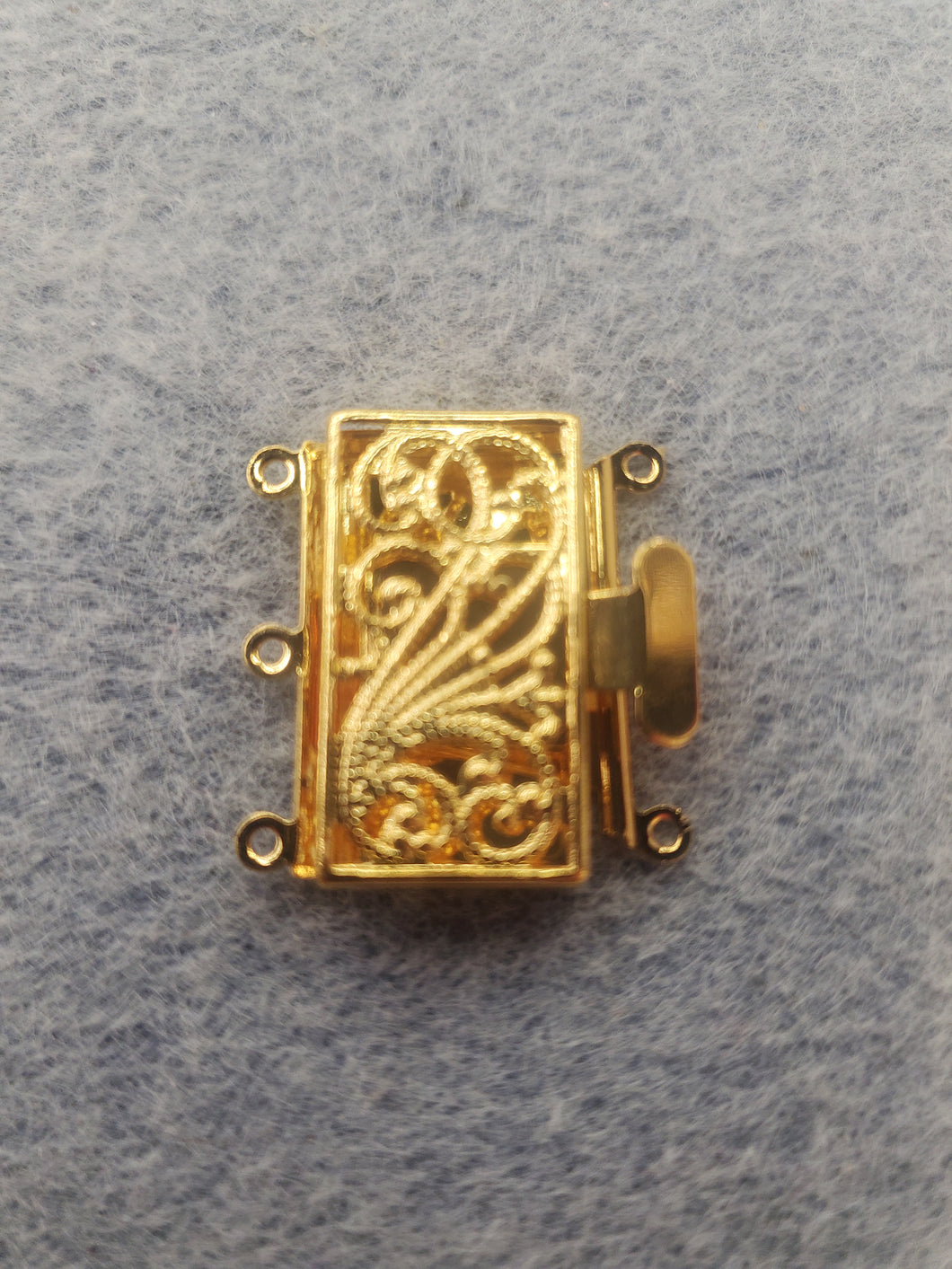 MULTI-STRAND BOX CLASP