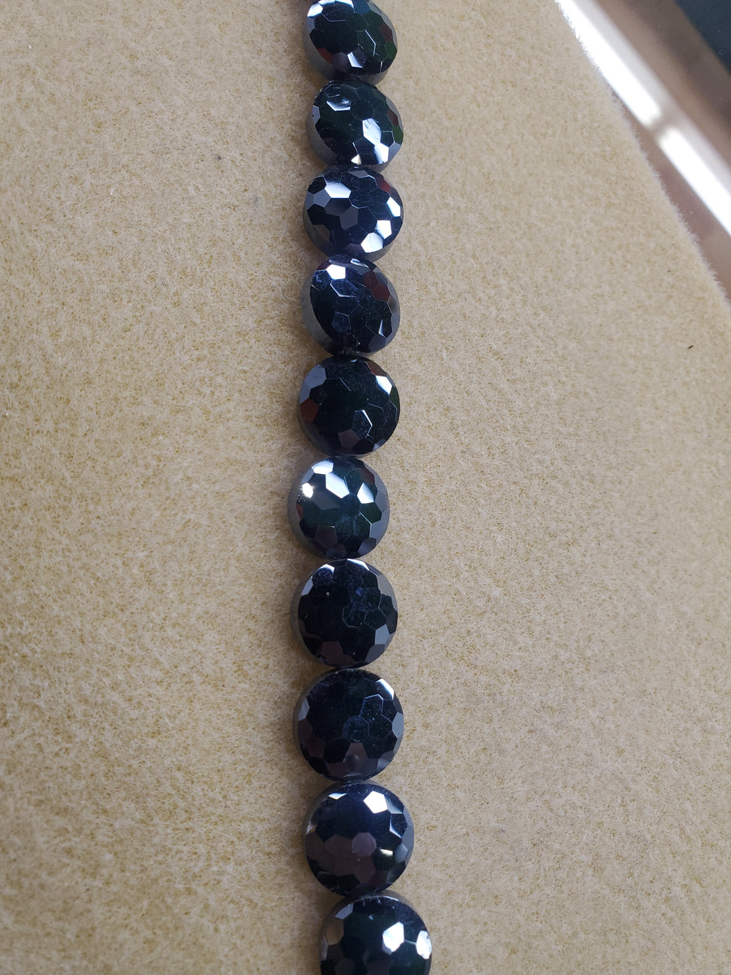 PEARL LUSTER FACETED FLAT ROUND 14X8MM