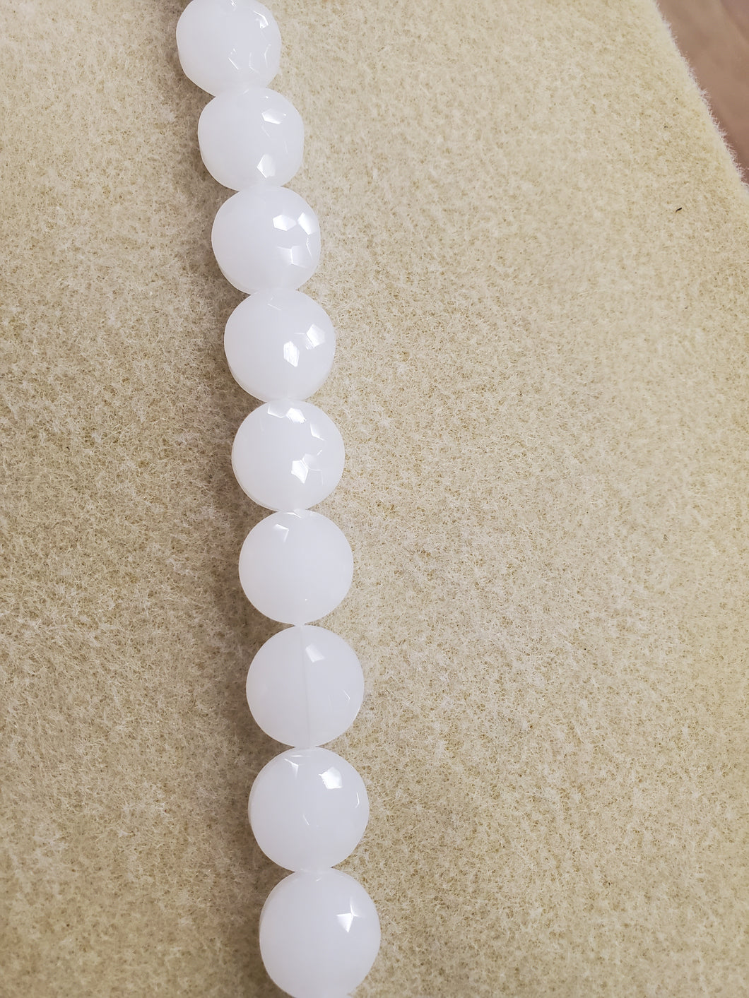 PEARL LUSTER FACETED FLAT ROUND 14X8MM