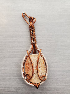 FOSSIL CORAL GUITAR PENDANT