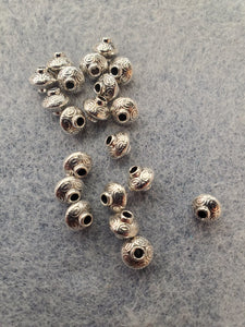 BICONE SPACER