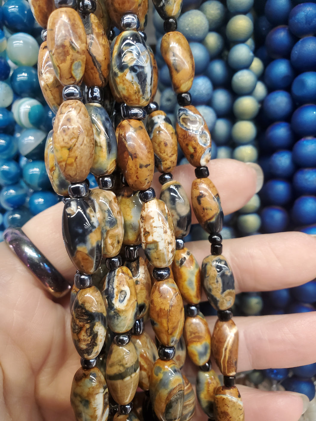 FIRE AGATE OVAL 15.5-16.5X8.5MM