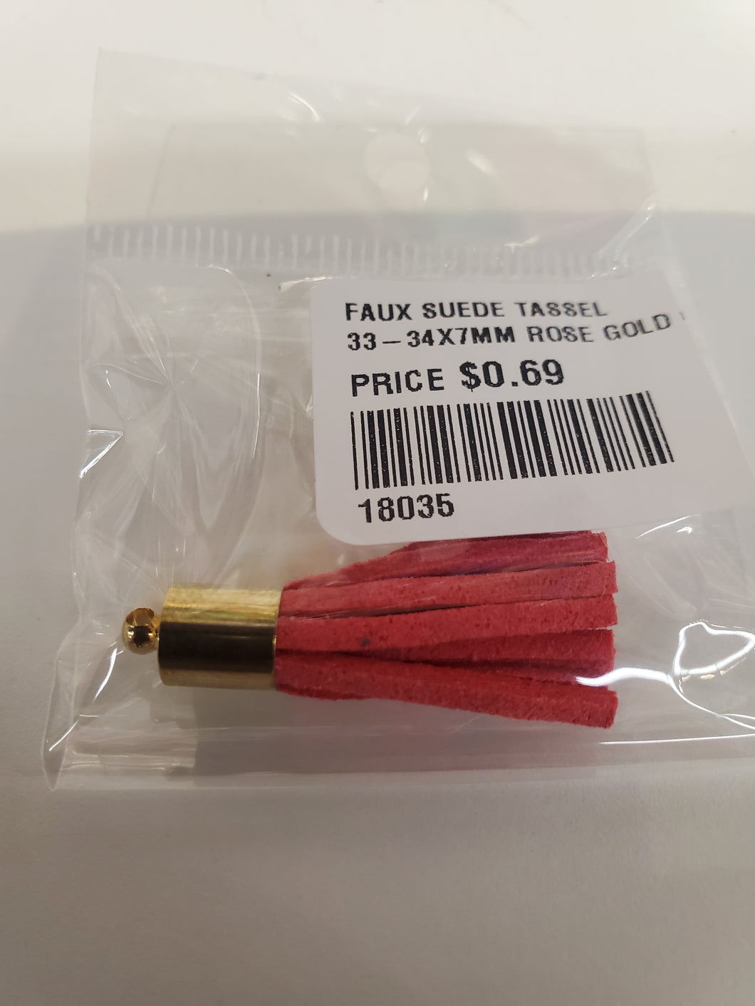 FAUX SUEDE TASSEL