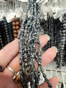 SNOWFLAKE OBSIDIAN OVAL 6-7X4.5MM