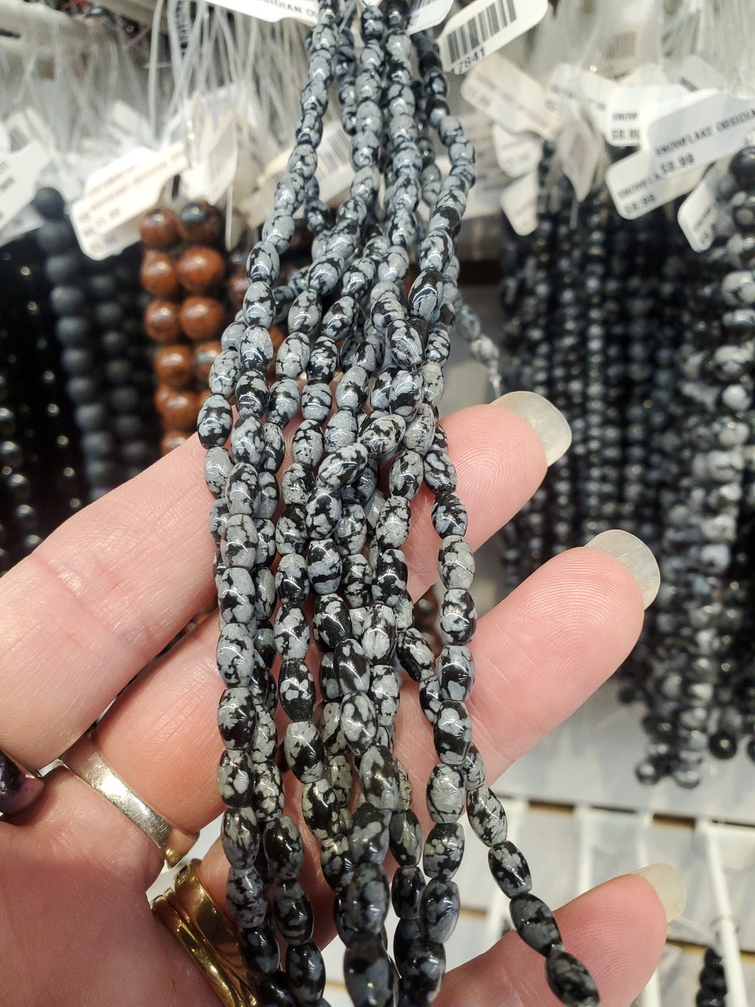 SNOWFLAKE OBSIDIAN OVAL 6-7X4.5MM