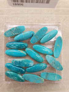 TURQUOISE CABOCHON OVAL 20X7MM