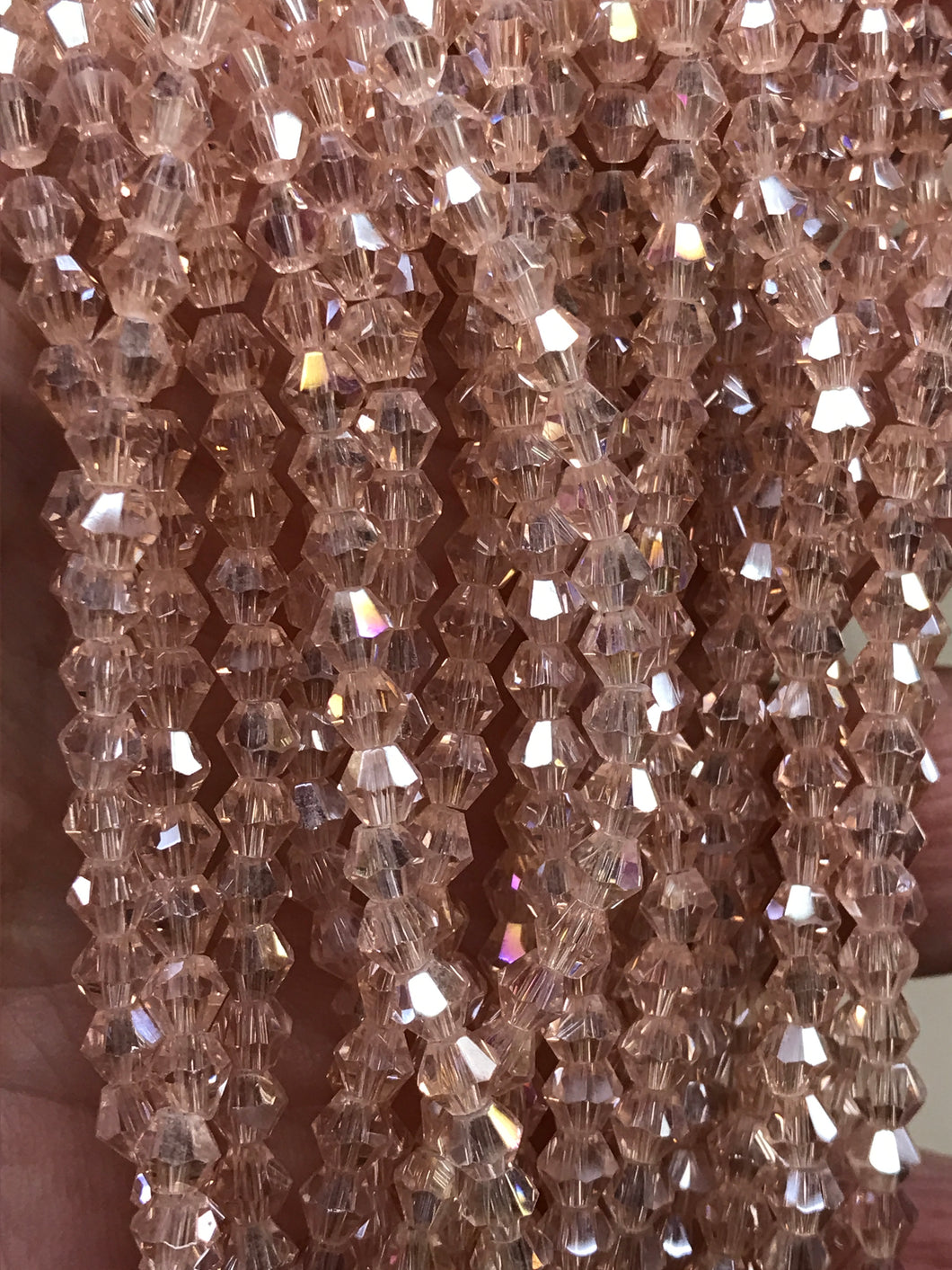 GLASS BICONE FACETED 4MM