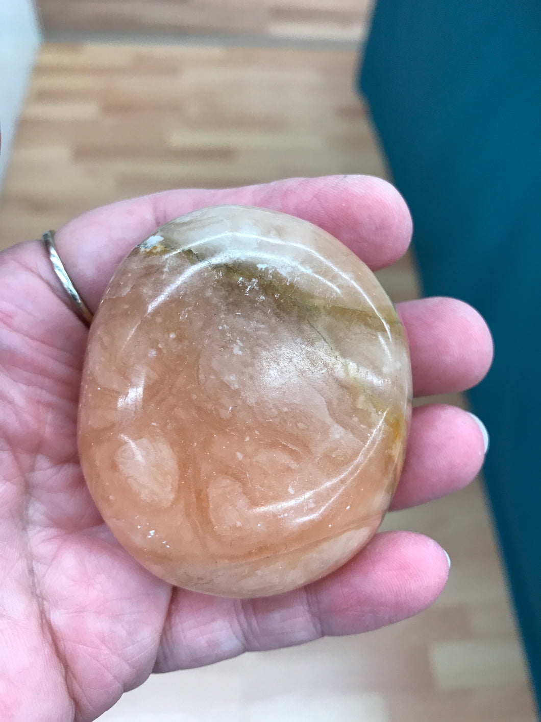 ORANGE TWIST CALCITE PALM STONE