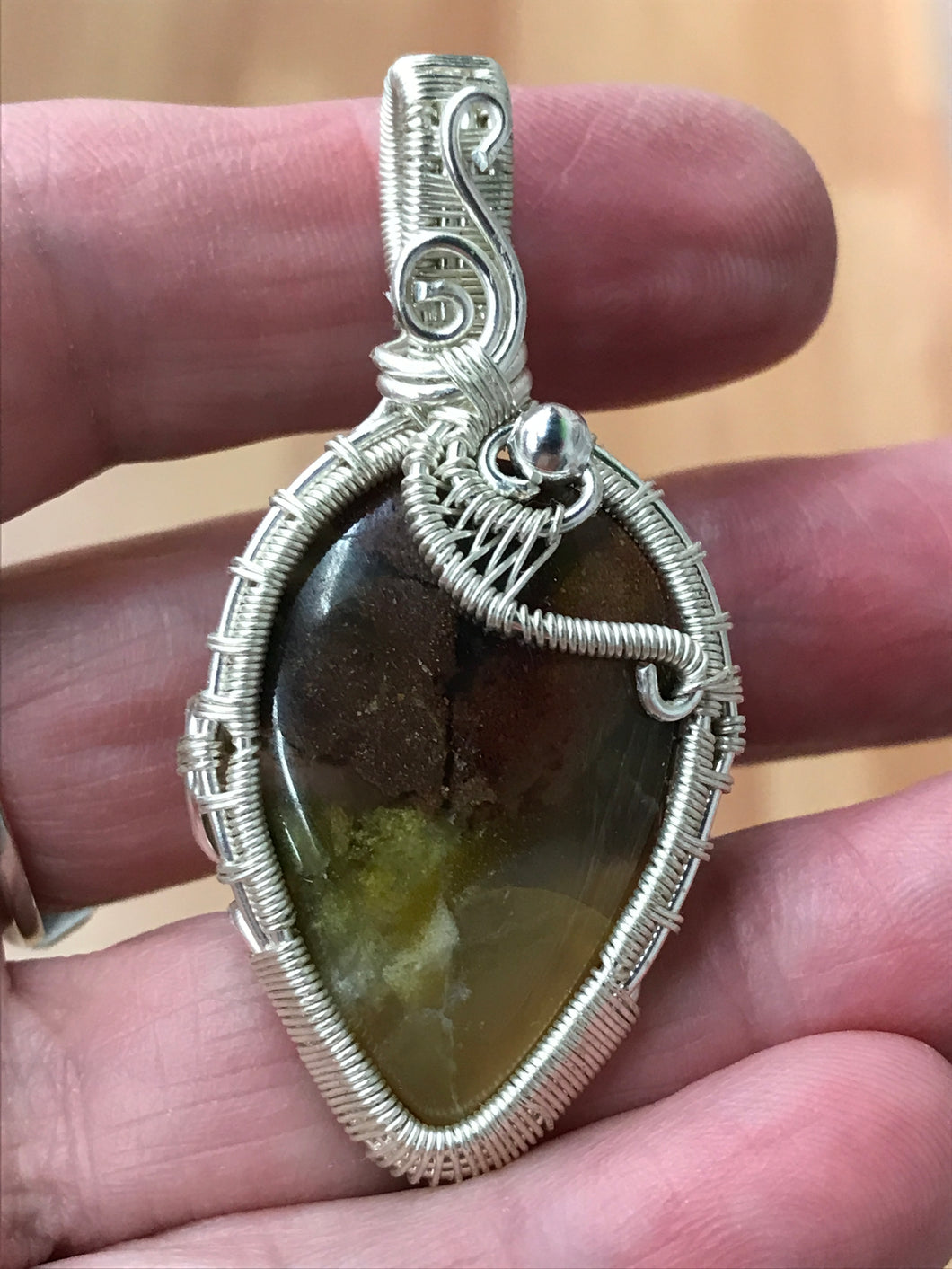 WIRE WRAPPED PETRIFIED WOOD PENDANT