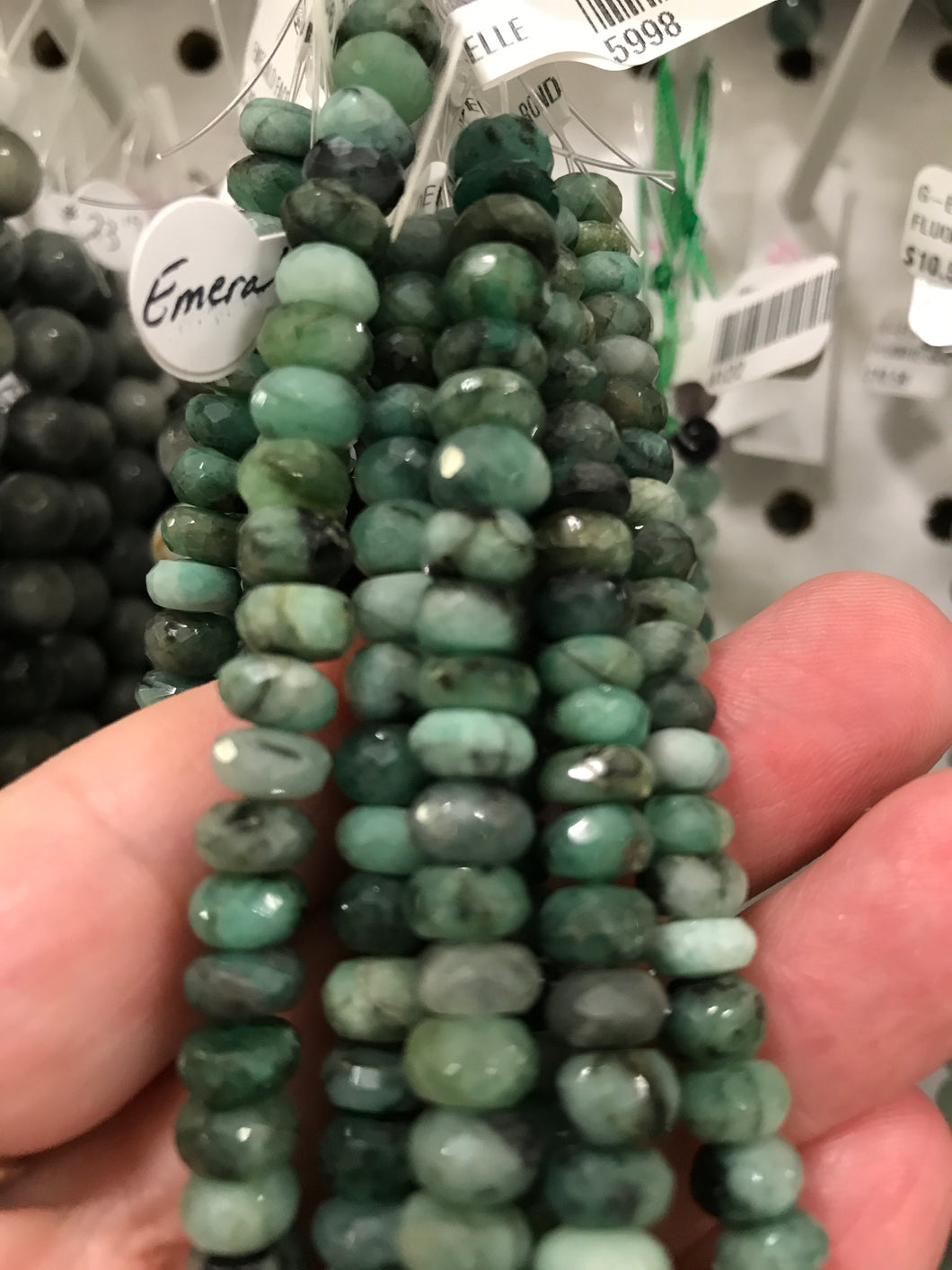 EMERALD FACETED RONDELLE