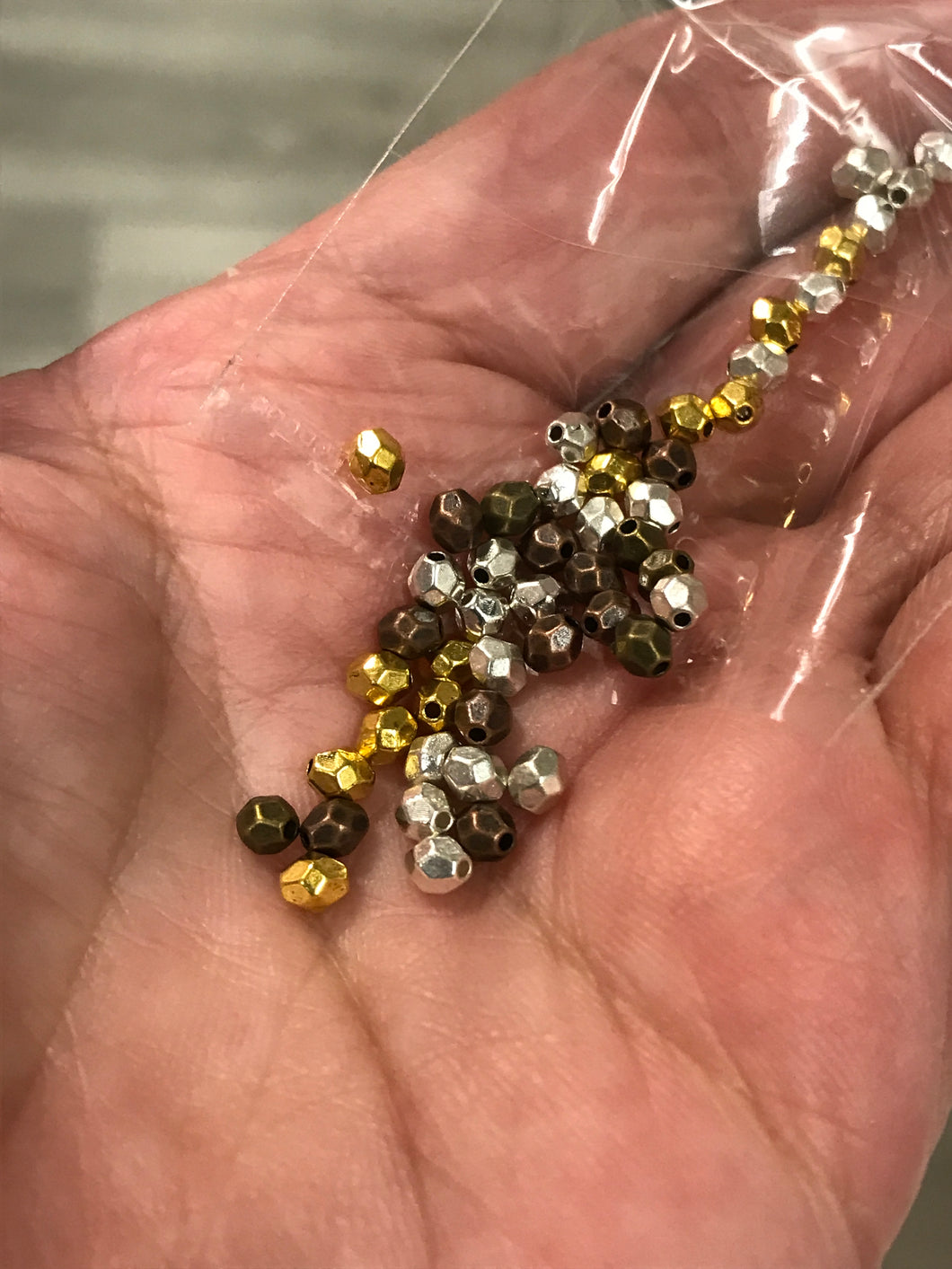 FACETED OVAL SPACER