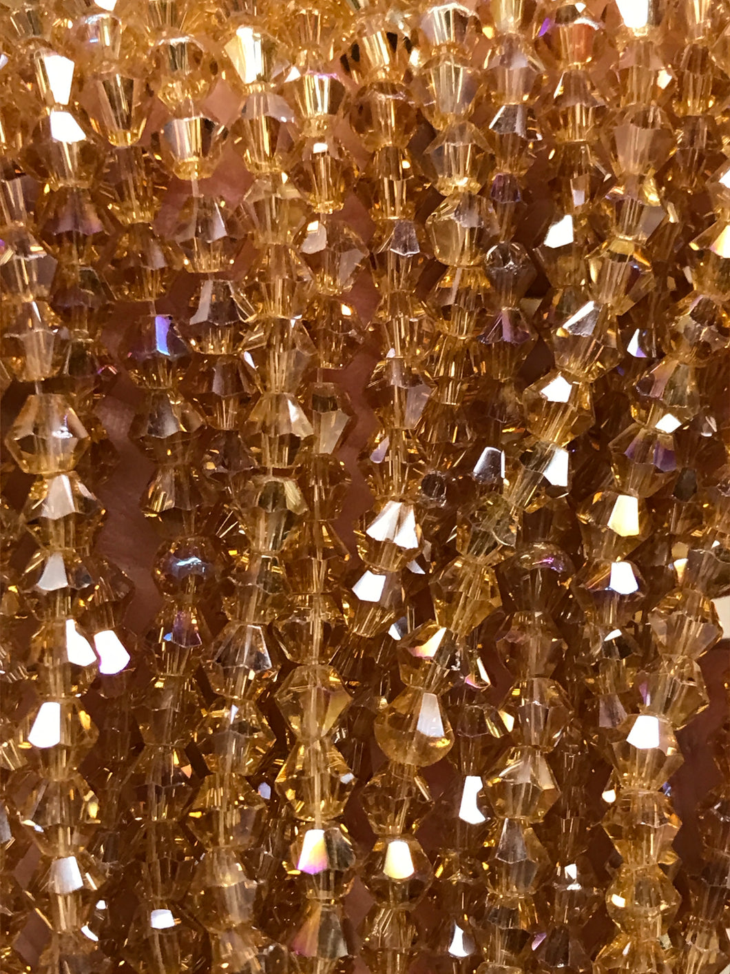 GLASS BICONE FACETED 4MM