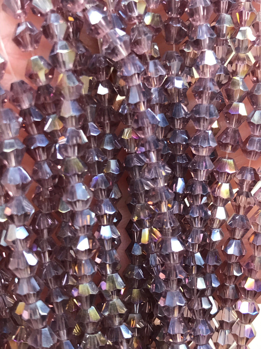 GLASS BICONE FACETED 4MM