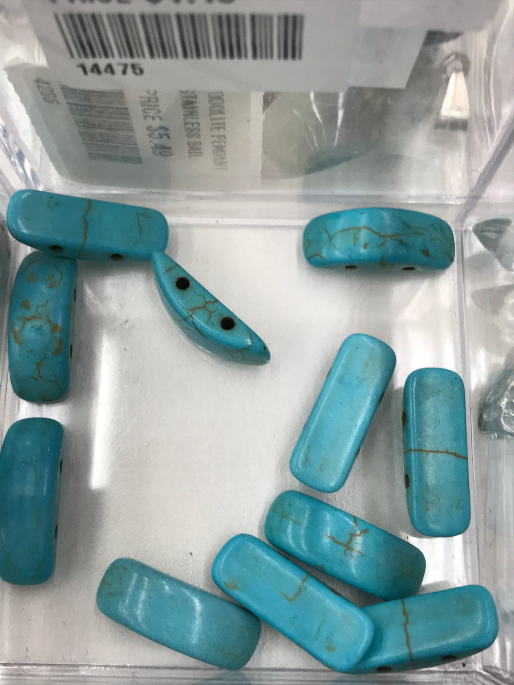 HOWLITE DOUBLE DRILLED 22X8X6MM