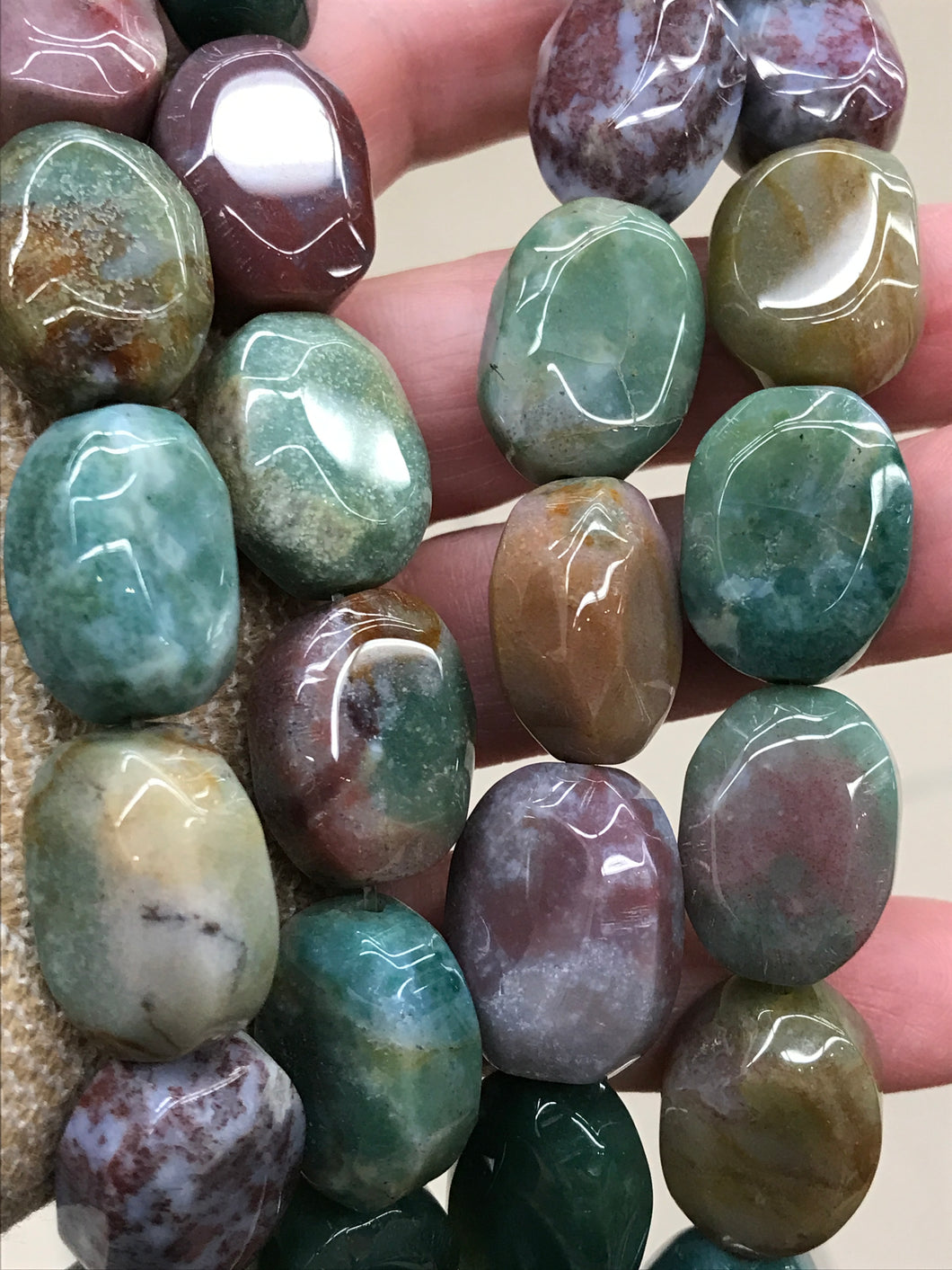 FANCY JASPER FACETED OVAL 20X15X10MM