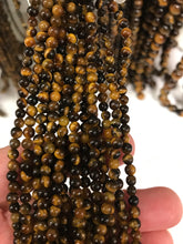 Load image into Gallery viewer, Tiger Eye
