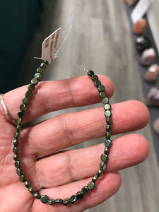 SYN. HEMATITE FLAT ROUND