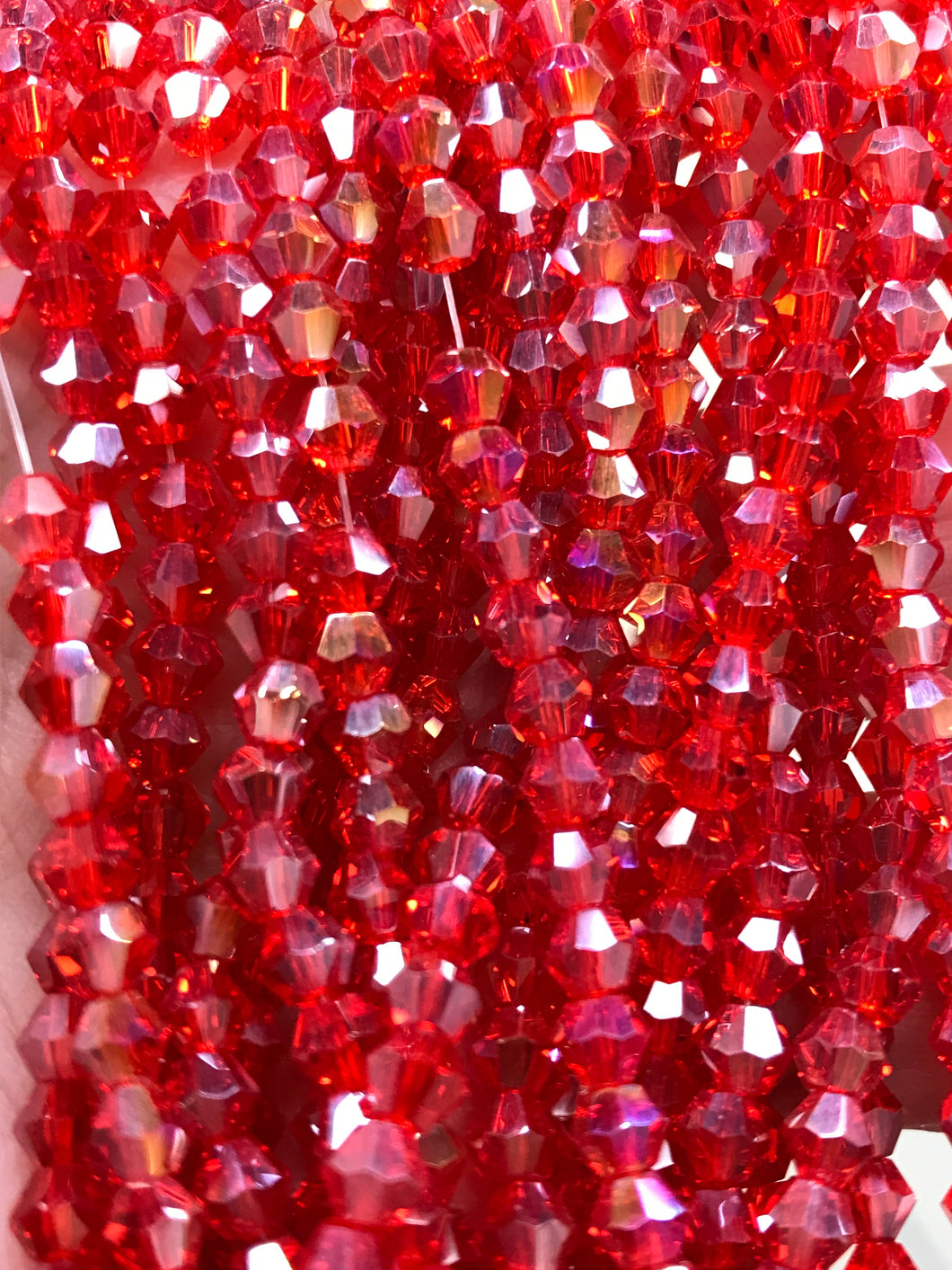 GLASS BICONE FACETED 4MM
