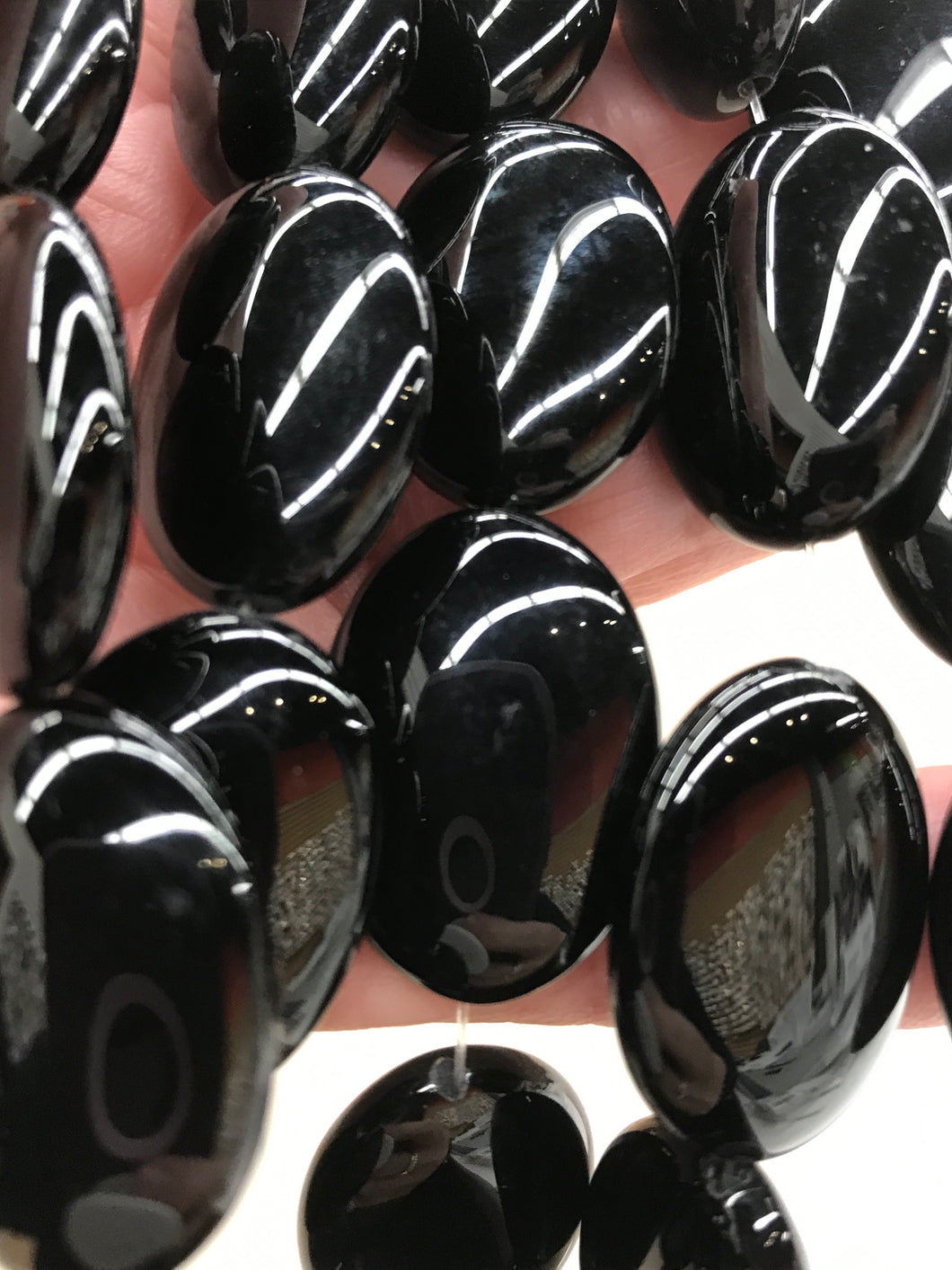 ONYX OVAL 24-25X18X7-8MM