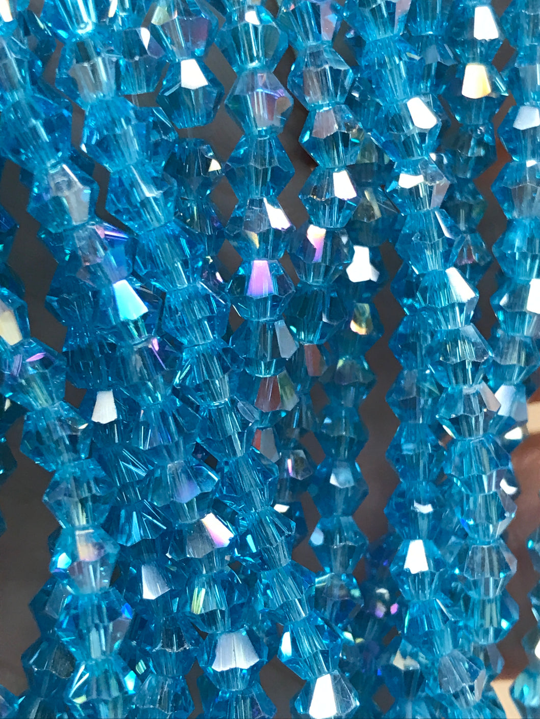 GLASS BICONE FACETED 4MM