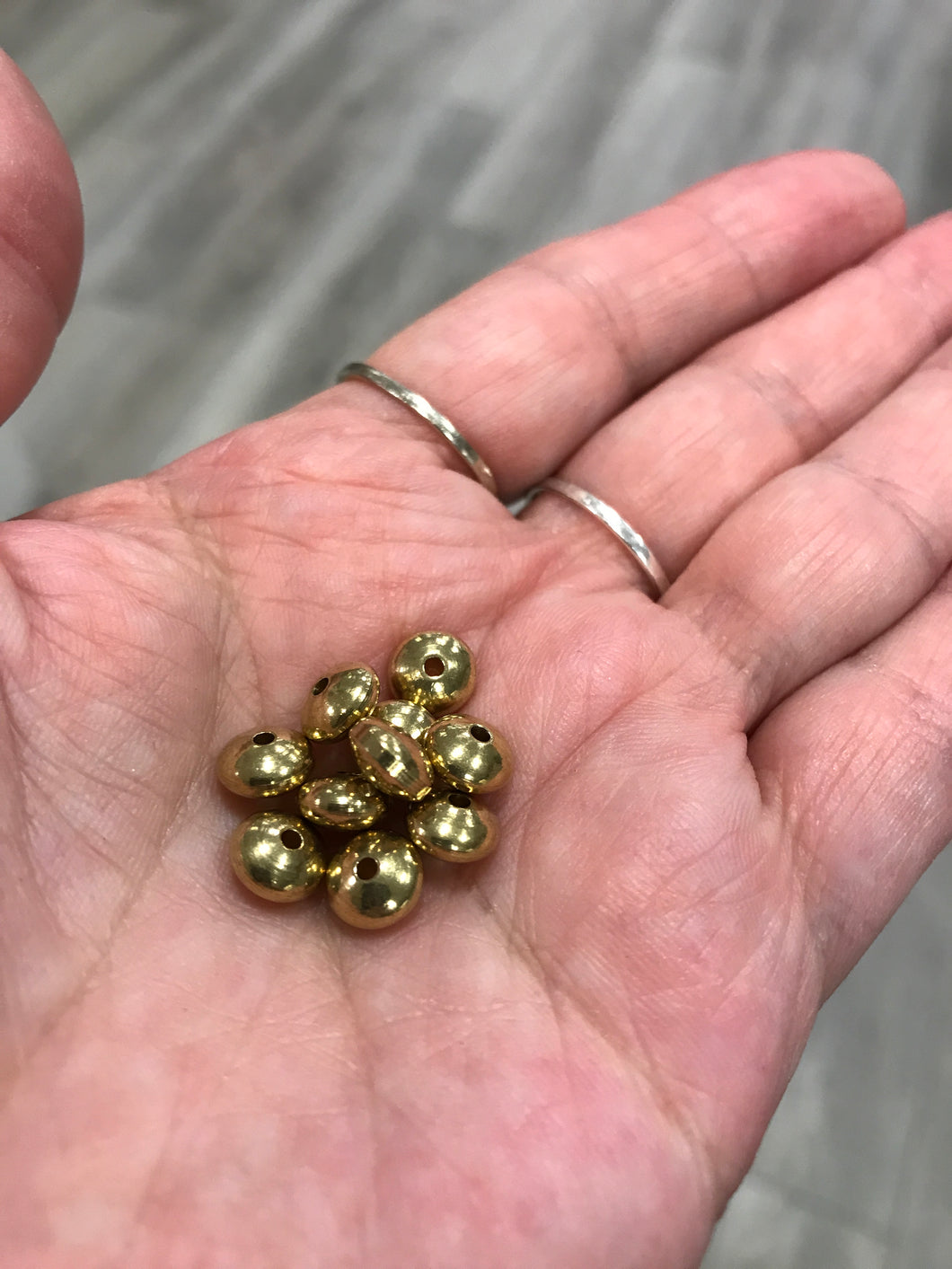 UNPLATED BRASS BICONE
