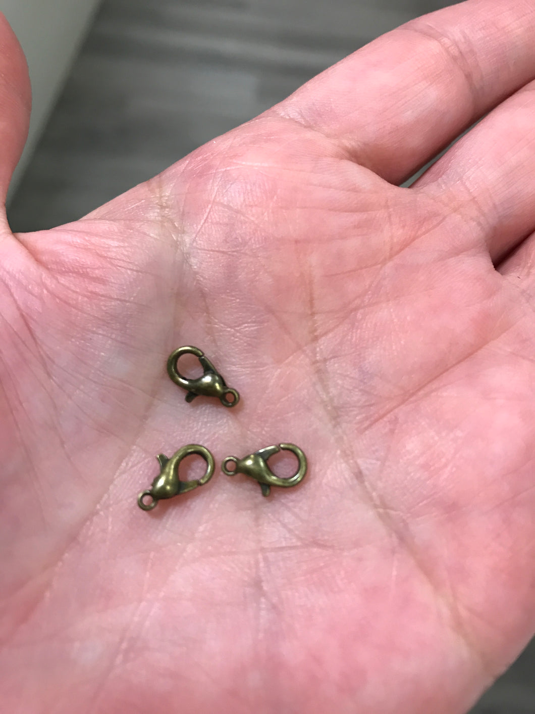 LOBSTER CLASP ANT. BRONZE