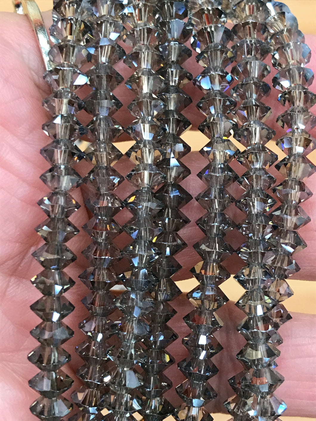 ELECTROPLATED GLASS FACETED BICONE 6X3.5MM
