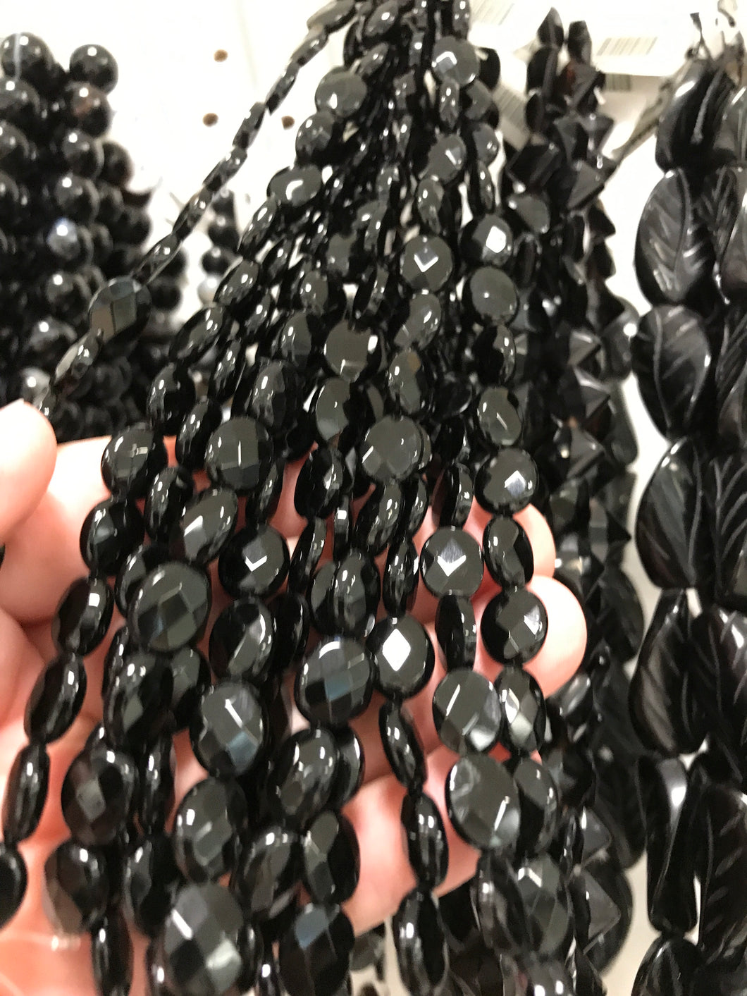 BLACK AGATE FACETED OVAL