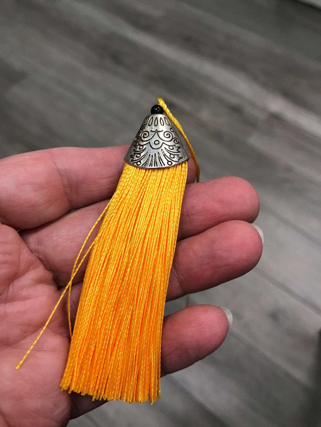 TASSEL GOLD