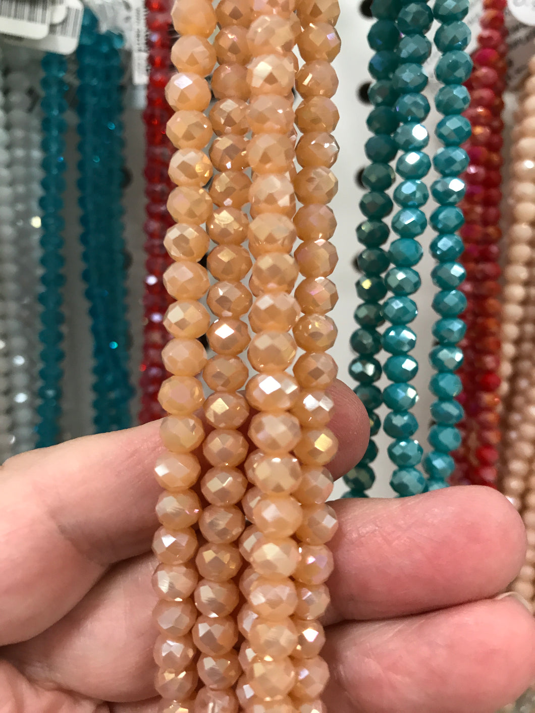 ELECTROPLATED GLASS FACETED PEACH AB