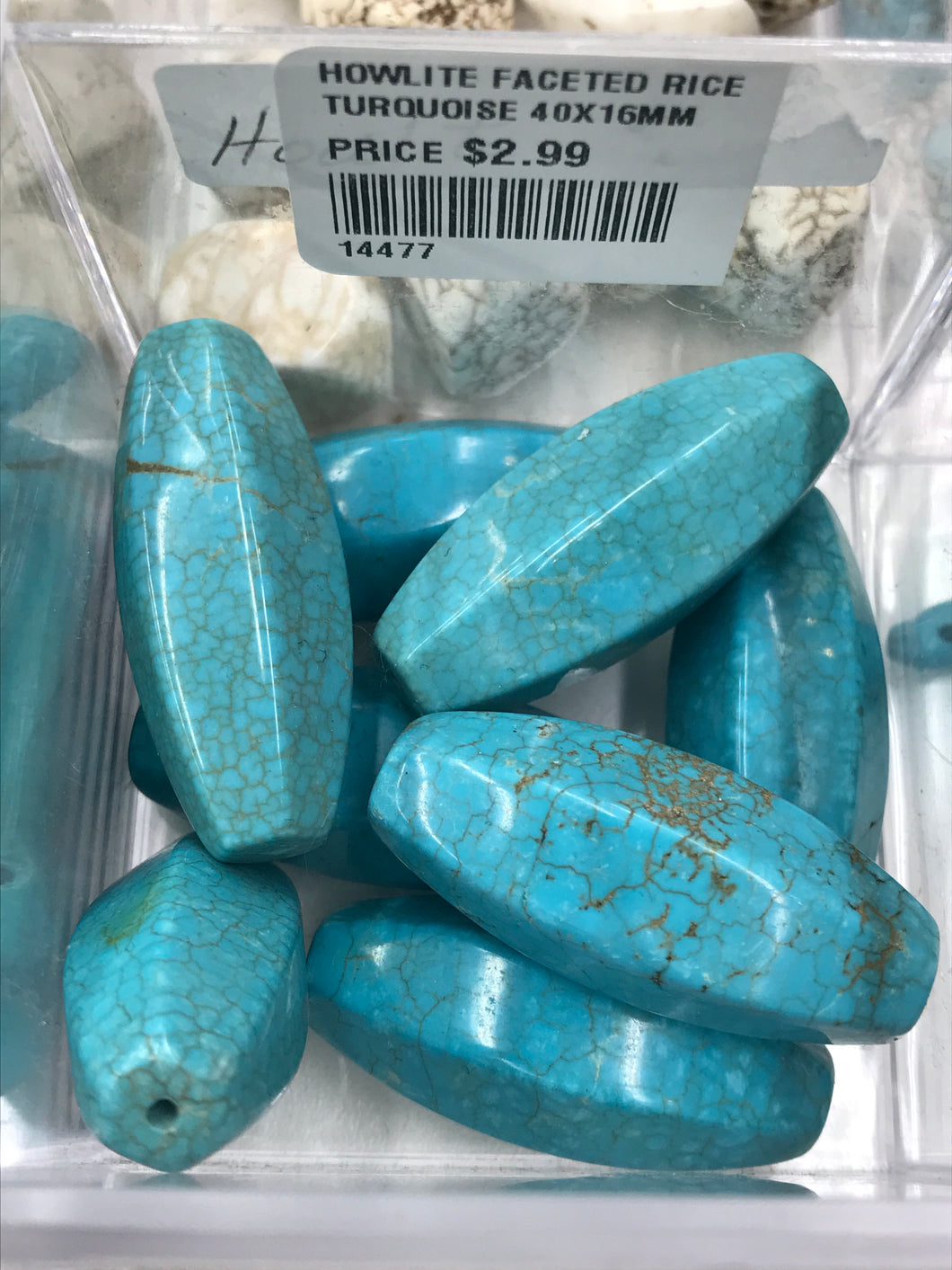 HOWLITE FACETED RICE 40X16MM