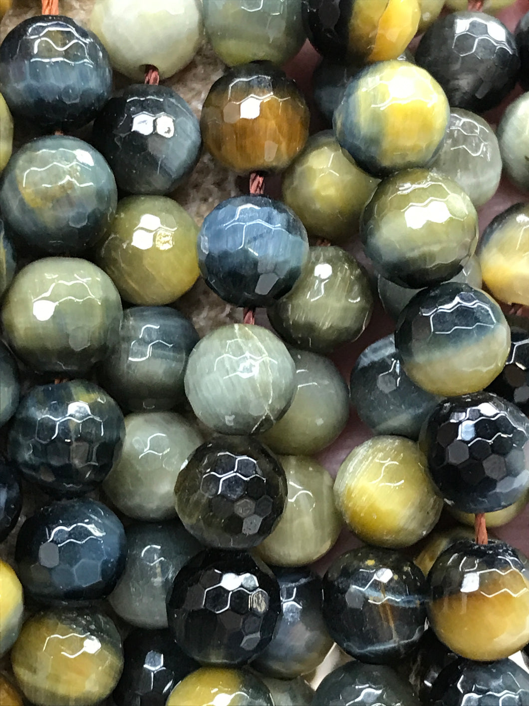 HAWKS EYE 8MM FACETED