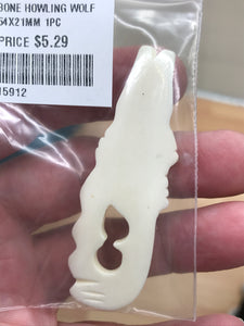 BONE HOWLING WOLF PENDANT