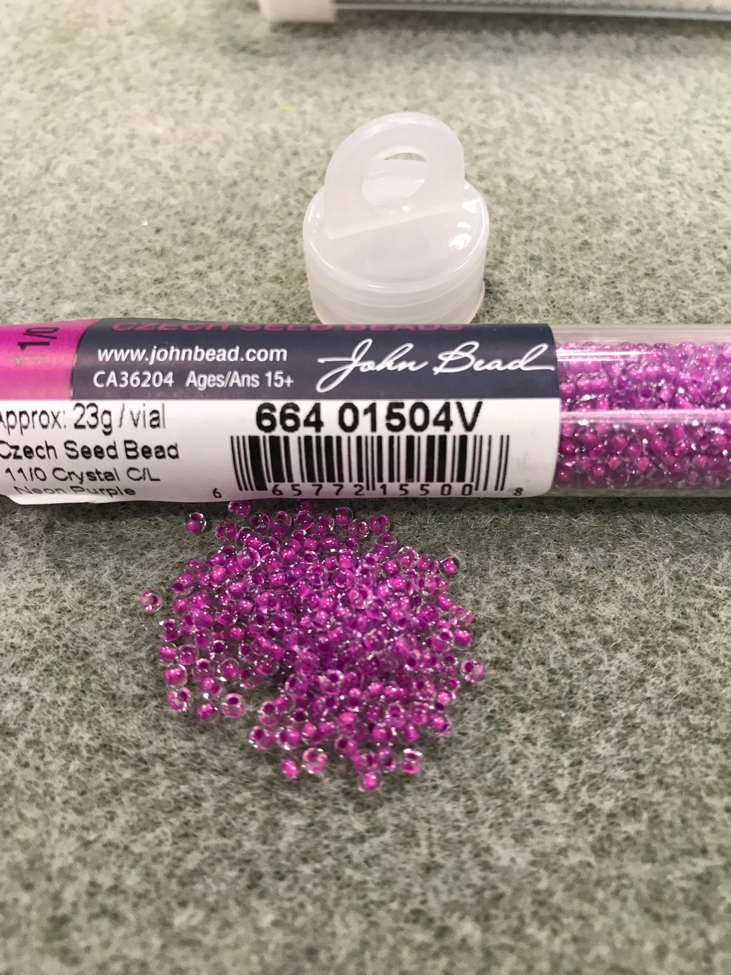 CZECH SEED BEAD 11/0 CRYSTAL C/L NEON PURPLE 01504