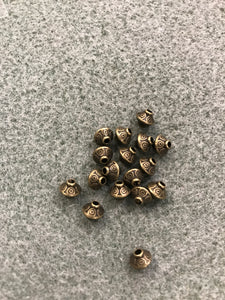 ANT. BRONZE BICONE SPACER