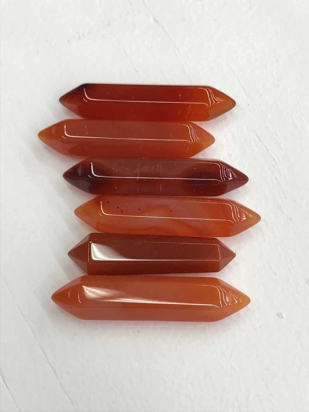 CARNELIAN DOUBLE TERMINATED POINT 31-36X7-8MM