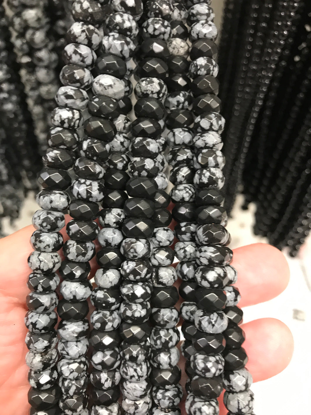 SNOWFLAKE OBSIDIAN FACETED 8X5MM