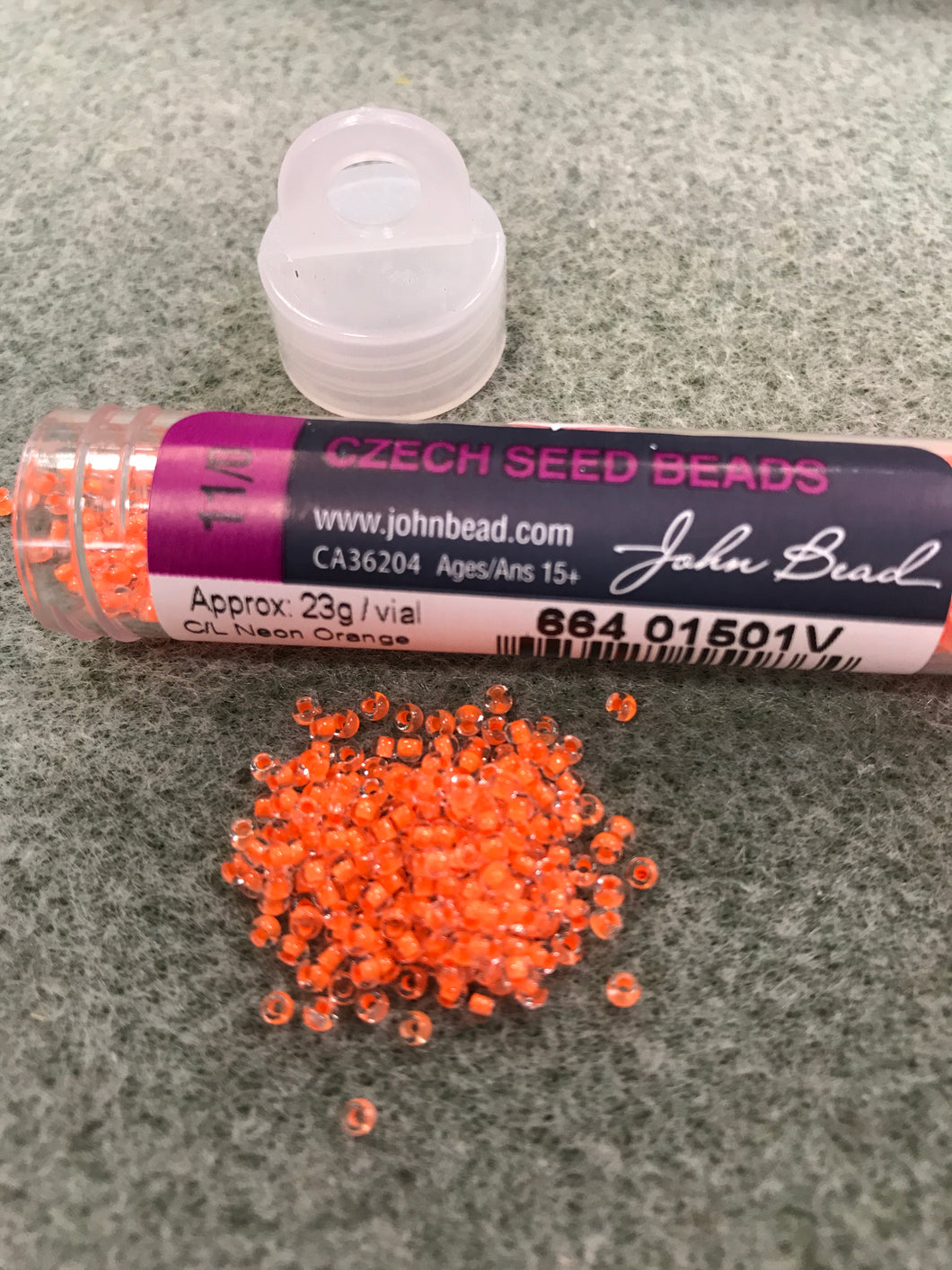 CZECH SEED BEAD 11/0 CRYSTAL C/L NEON ORANGE 01501